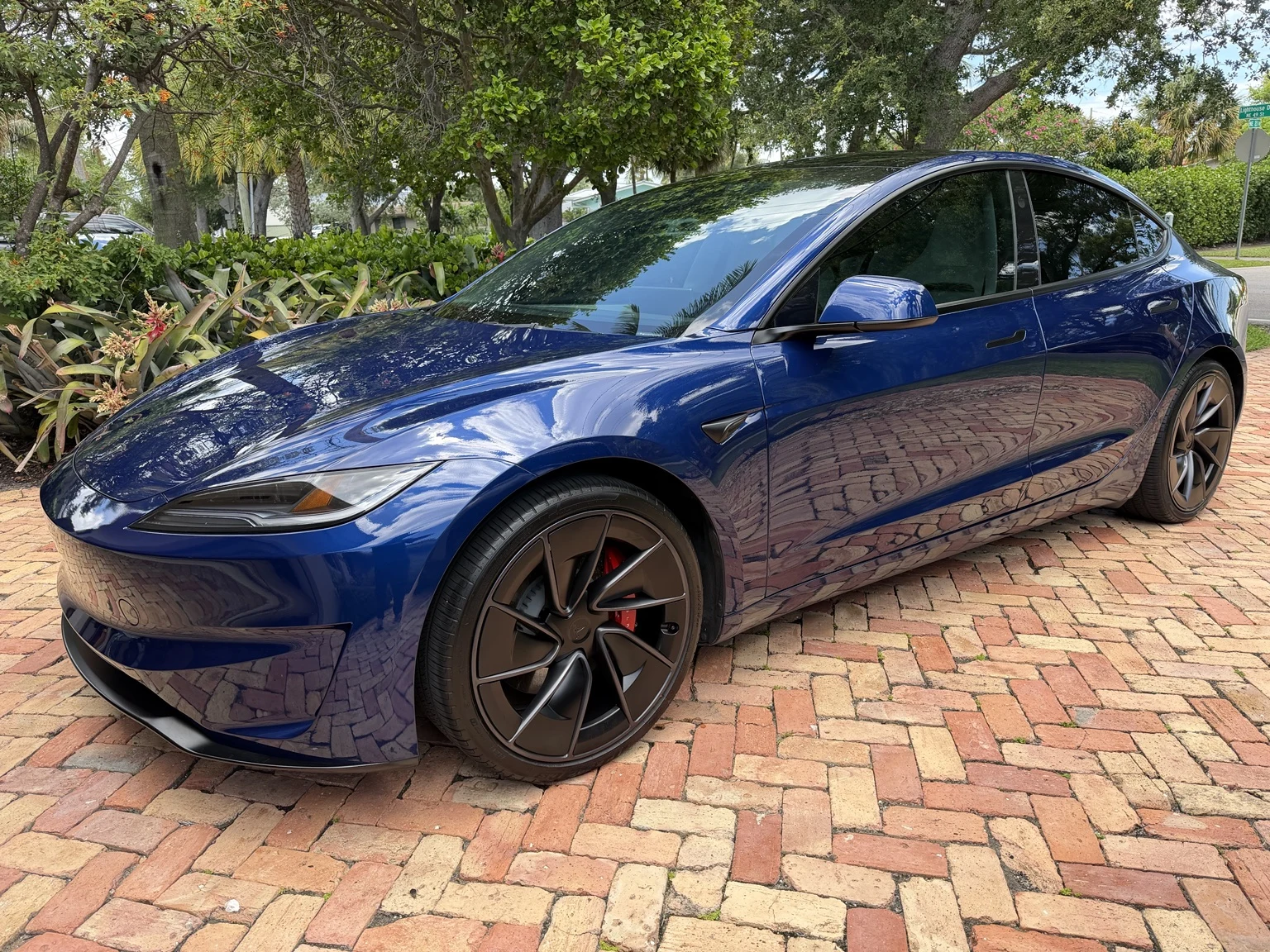 Tesla sedan with a freshly detailed exterior