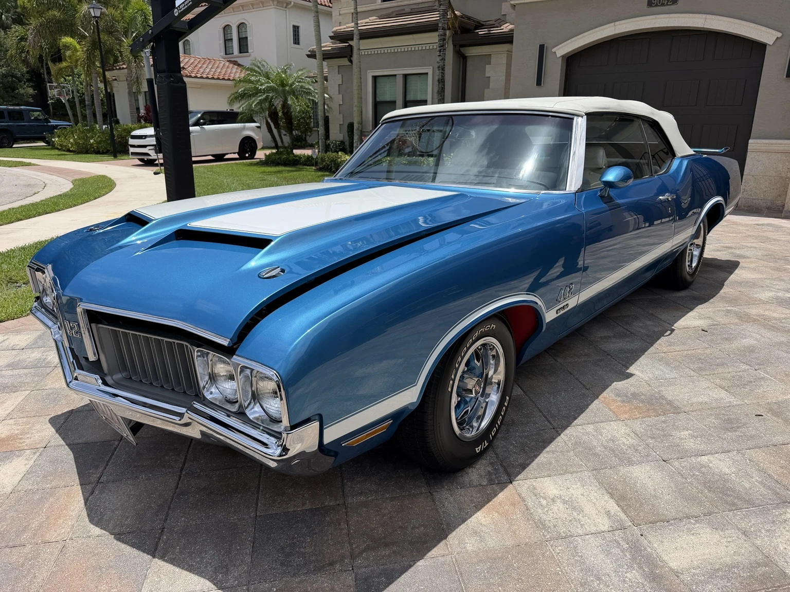 Oldsmobile convertible with a freshly detailed exterior